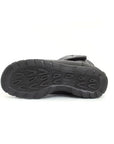 Black treaded outsole with geometric pattern.