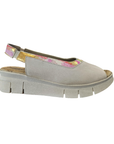 Sandal in beige, pink and gold shimmery slingback strap, beige Cloud logo'd footbed and off-white wedge outsole.