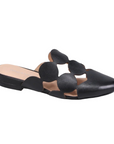 Leather Mules in black with circular cutout design and low heel.
