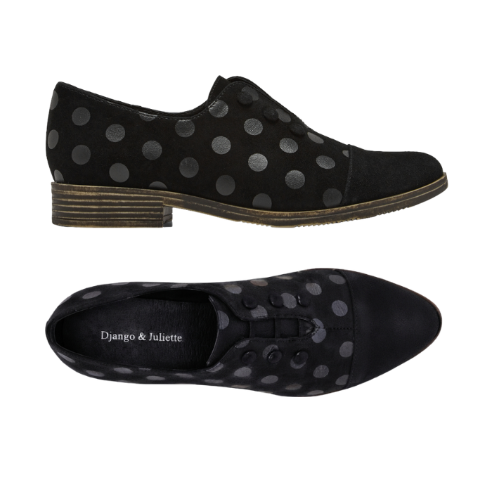 Pair of black suede oxford-style shoes with metallic black polka dots, button elastic lacing system, Django and Juliette logo'd footbed and low stacked heel.