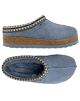 Pair of  blue platform suede clogs with Aztec pattern cuff, blue shearling lining, cork midsole and blue EVA outsole.