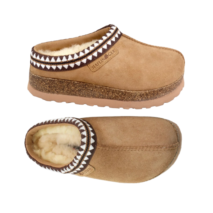 Pair of tan platform suede clogs with Aztec pattern cuff, blue shearling lining, cork midsole and tan EVA outsole.