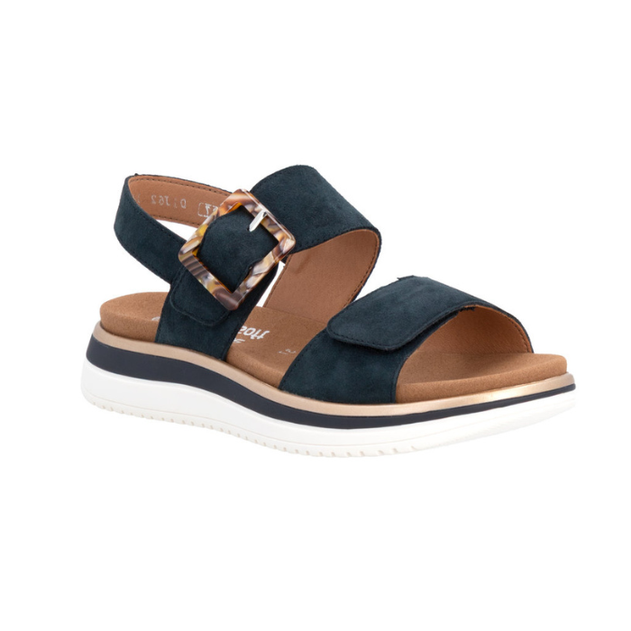 Navy backstrap sandal with brown marble buckle, tan Remonte logo'd footbed and white outsole.