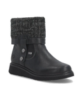 A black ankle boot with a dark gray and black knit cuff, a black strap with silver buttons, and a black outsole.