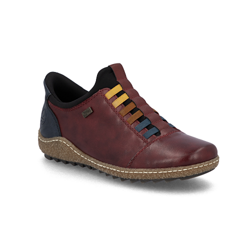 A deep red slip-on shoe with a black heel tab,  colorful elastic laces in yellow, brown, and blue, a  beige textured midsole and black treaded outsole.