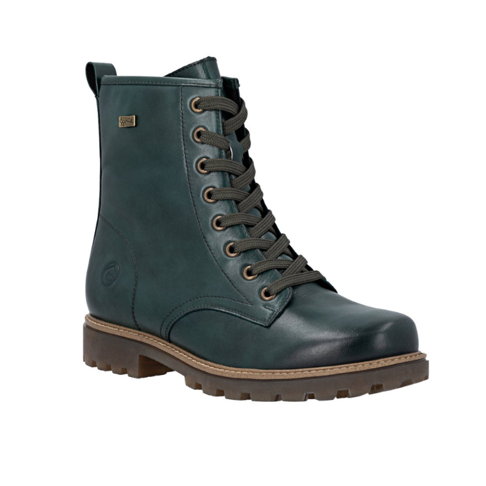 Green leather combat boot with 8 dark green laced eyelets, light brown midsole and dark brown rubber lugged outsole.