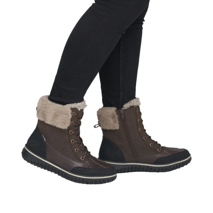 Brown lace-up ankle boot with black treaded outsole.