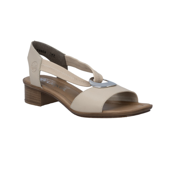 Beige slingback leather sandal with metallic medallion, tan Rieker logo'd footbed and low block heel.
