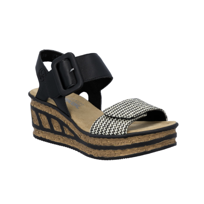 Black wedge sandal with a checkered toe band strap, faux buckle on top Velcro strap and a faux cork wedge midsole with black accent lines.