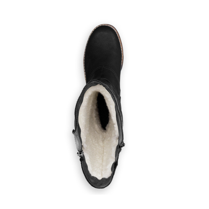 Black boot with white fur lining and two side zippers.