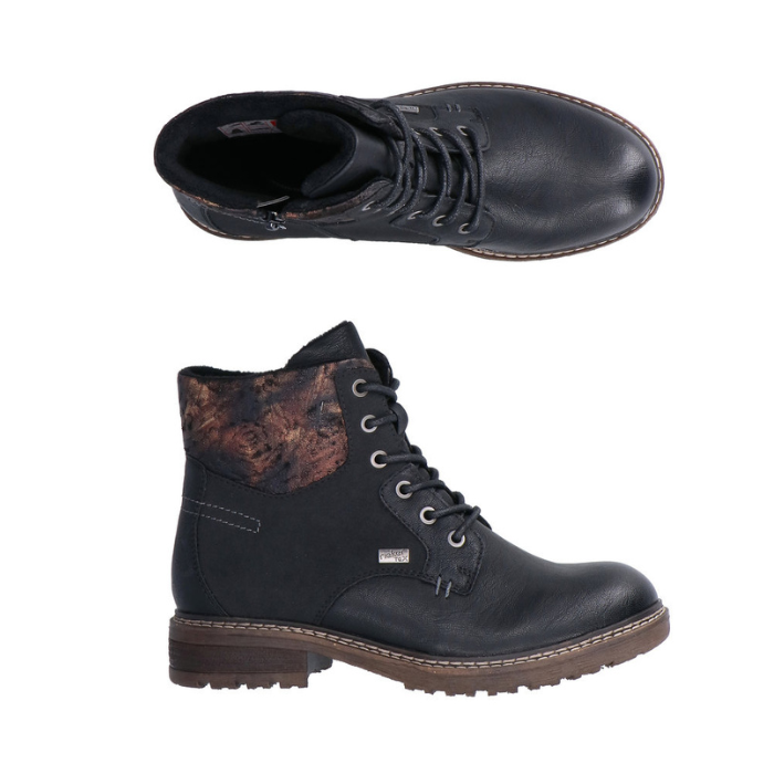Pair of Pair of black lace up boots with floral cuffs inside zipper and a low heel.
