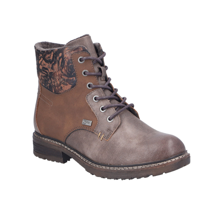 Brown lace up boot with distressed accents, floral cuff and a low heel.