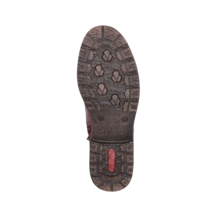 Brown light treaded outsole with red Rieker logo on heel.