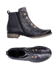 Navy ankle boot with button details on front and low heel. Black inside zipper closure.
