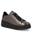 Metallic bronze sneaker with thick black laces, black heel cap, accent stitching and thick black platform outsole.