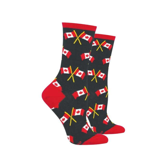 A pair of black crew socks patterned with crossed Canadian flags, featuring solid red heels, soles, and cuffs.