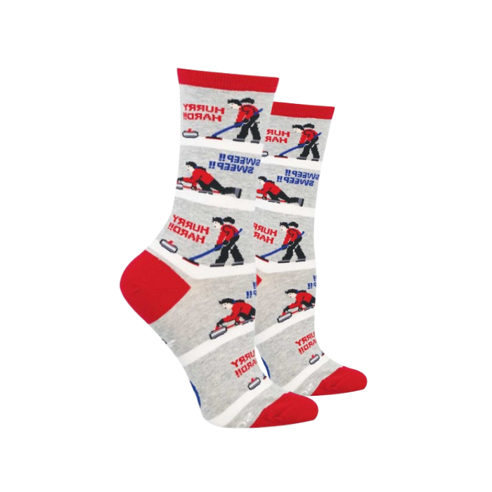 A pair of crew socks in grey heather base with a repeating pattern of curlers in red with words "sweep sweep" and "hurry hard".
