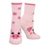 Pink fuzzy socks with pig face and pink polka dot design. 