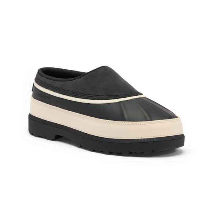 A slip-on clog-style shoe in black with off-white accent and black treaded outsole.