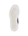White gum outsole with light tread, cream center and Sorel logo stamped in middle.