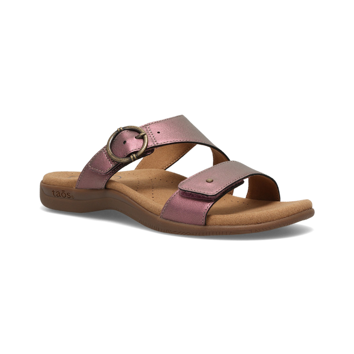 Purple metallic slide sandal with two Velcro straps, detail buckle, beige Taos logo'd footbed and black outsole.