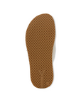 Outsole of Slide Sandal in tan with a zig-zag textured rubber outsole.