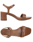 Pair of Brown sandals with thin straps, gold buckle, Naturalizer logo'd footbed and a block heel.