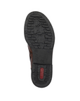 Black lightly treaded rubber outsole of boot with re Rieker logo on heel.