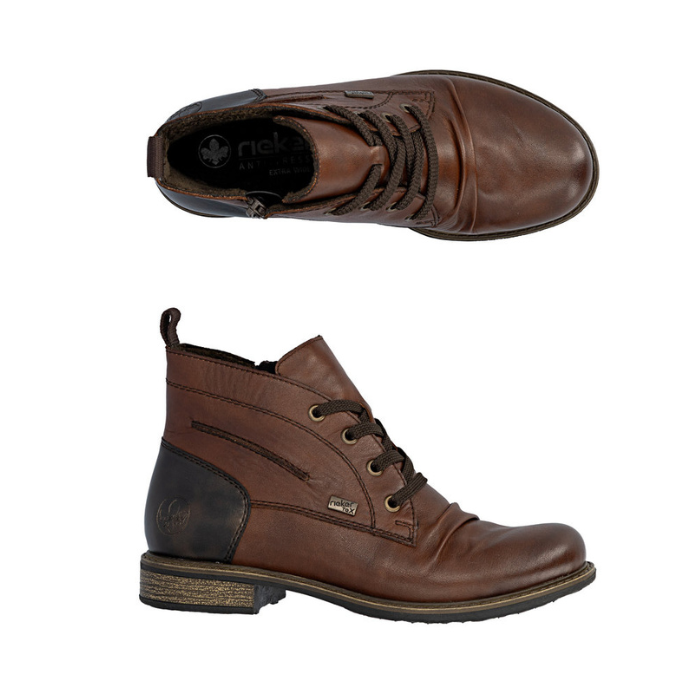 Pair of brown leather lace boots with brown laces, inside zipper, black heel cap and brown low outsole.