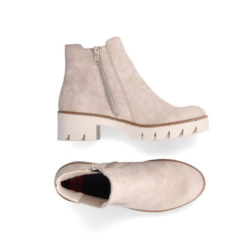 Pair of A beige Chelsea ankle boots with a chunky sole and side elastic goring.