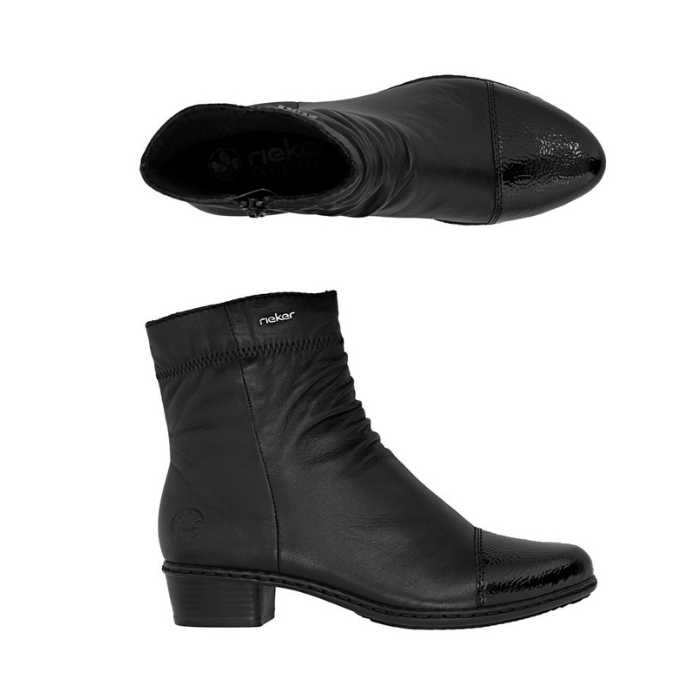 Pair of Black leather ankle boots with gathering at instep, side zipper, black patent toe cap and low heel.