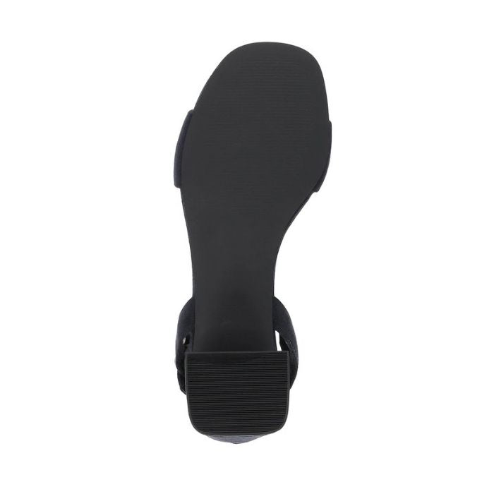 Black outsole with light tread and black heel.