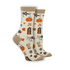 Pair of ivory socks with pumpkins, leaves and latte pattern with tan cuff, toe and heel cap.