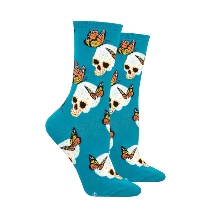 Pair of  blue socks with monarch butterflies and skulls all over both