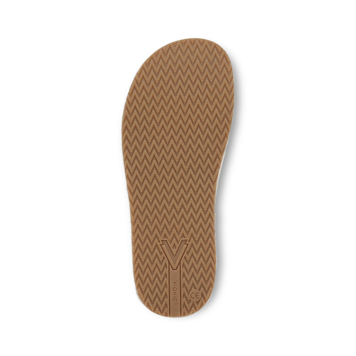 Tan outsole with a zigzag pattern.