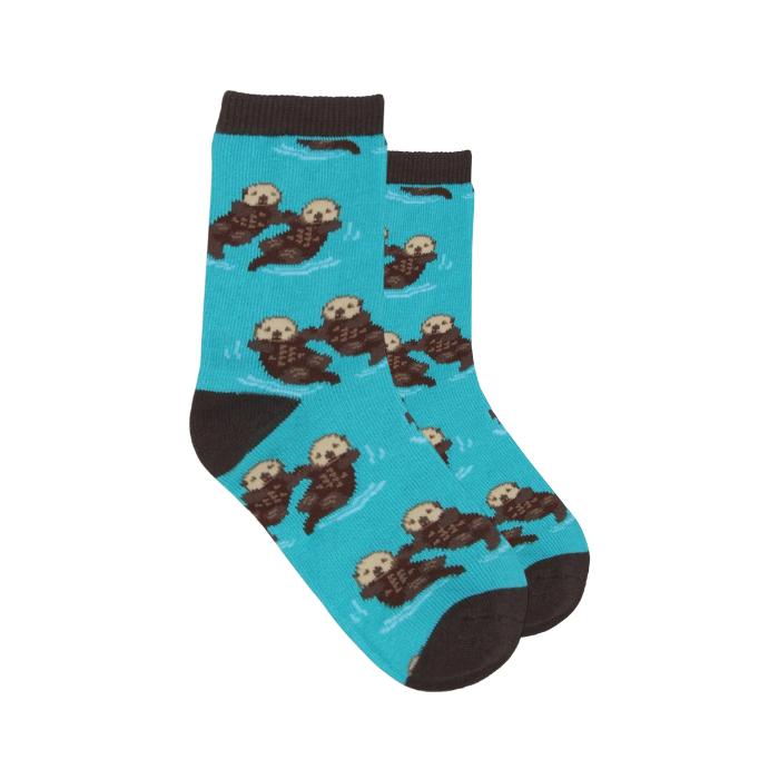 Socksmith blue sock with otters holding hands floating in the water.