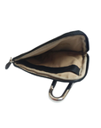 Open black leather coin purse with tan fabric lining and silver carabiner.