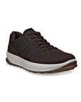Brown leather sneaker with thick white midsole and brown outsole.