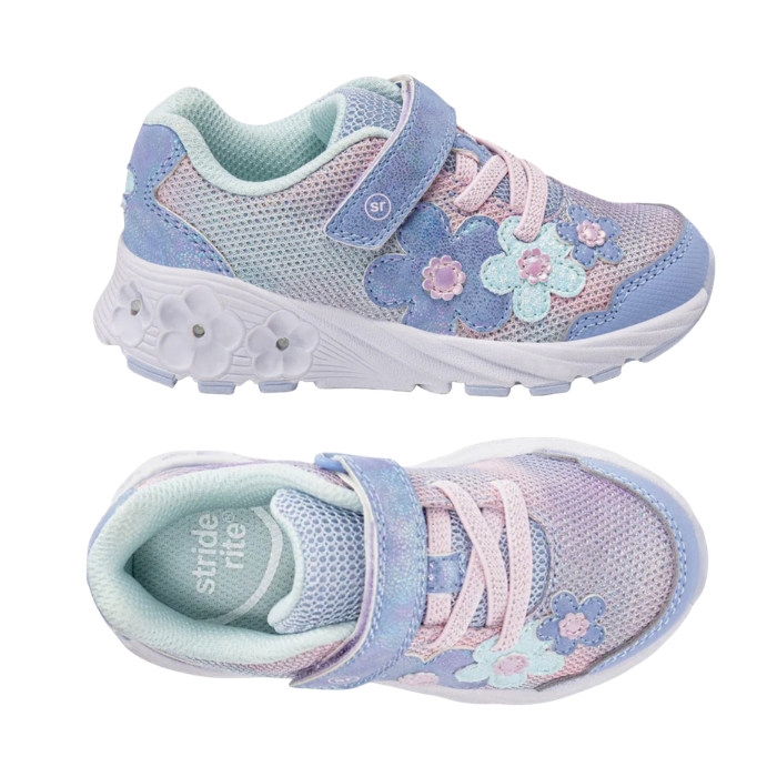 Pair of A children's sneakers in pastel blue, pink, and lavender with floral applique and a Velcro strap closure with a white outsole that has light up flowers.