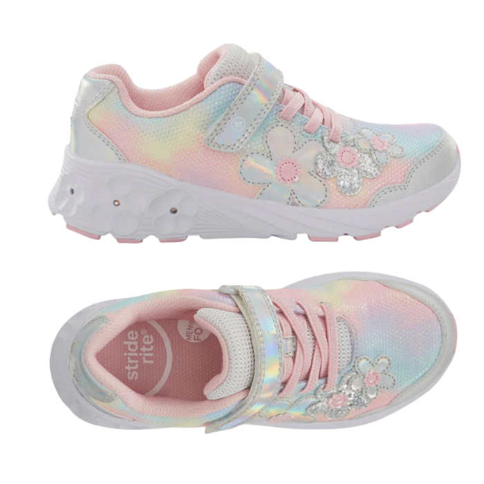 Pair of A children's sneakers in pastel pink, yellow, and blue with floral applique and a Velcro strap closure with a white outsole that has light up flowers.