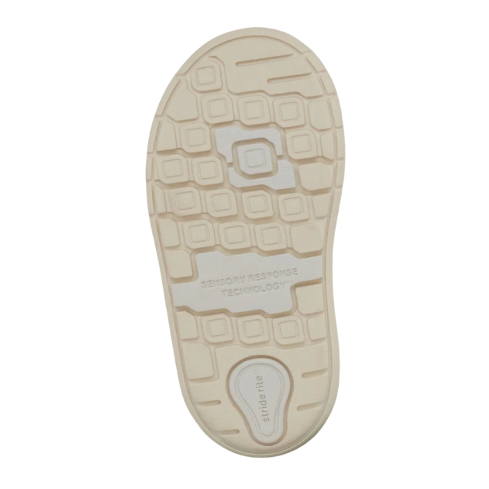 Beige outsole with sensory square design tread and Stride Rite logo stamped at the heel.