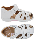 Pair of A toddler's white leather fisherman sandals with adjustable hook-and-loop strap, tan Stride Rite logo'd footbed and a contoured white outsole.
