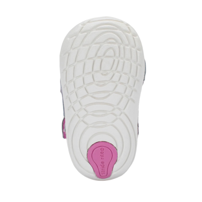 White outsole with soft motion technology tread and pink Stride Rite logo on heel.