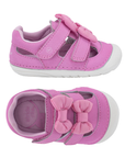 Pair pink toddler sandals with two hook-and-loop straps, a large matching bow on the toe and white soft bottom outsole.