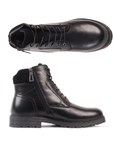 Pair of Black leather boots with laces, inside zipper and treaded outsole.