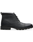 Profile of black leather ckukka boot with detailed stitching, black laces and black treaded outsole.