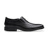 A black slip-on dress shoe with a leather upper and a rubber outsole.