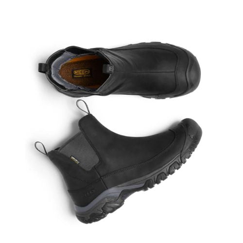 Pair of Black Chelsea boots with two pull tabs, logo'd Keen brown footbed, elastic side goring and a rugged outsole with toe bumper.