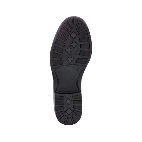 Black geometric treaded outsole on ankle boot.