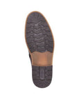 Dark brown and tan treaded outsole with Rieker logo stamped in heel.
